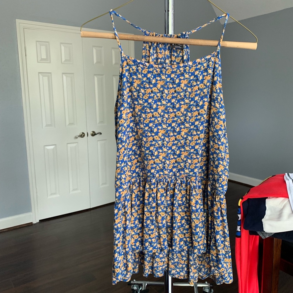 Blue Sleeveless Shirt with Flowers